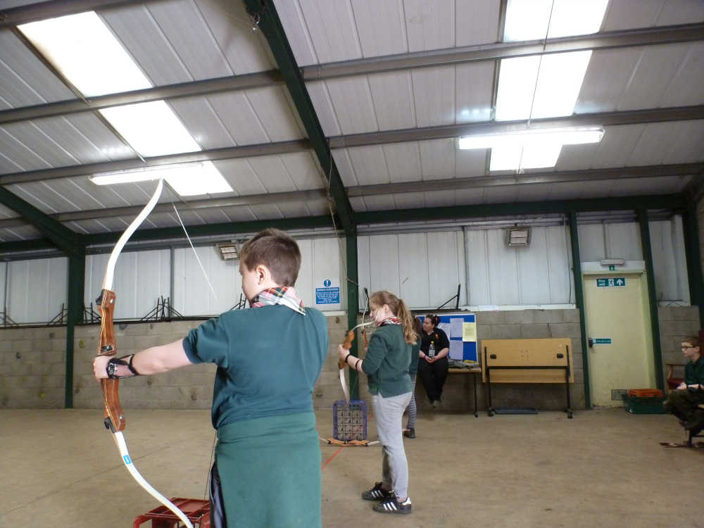 Picture of Cubs doing archery